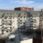 vue-facade-rehabilitee-et-surelevation-residence-champigny-cruard-charpente